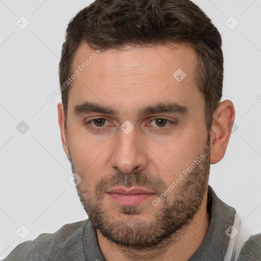 Neutral white young-adult male with short  brown hair and brown eyes