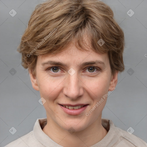 Joyful white young-adult female with short  brown hair and grey eyes