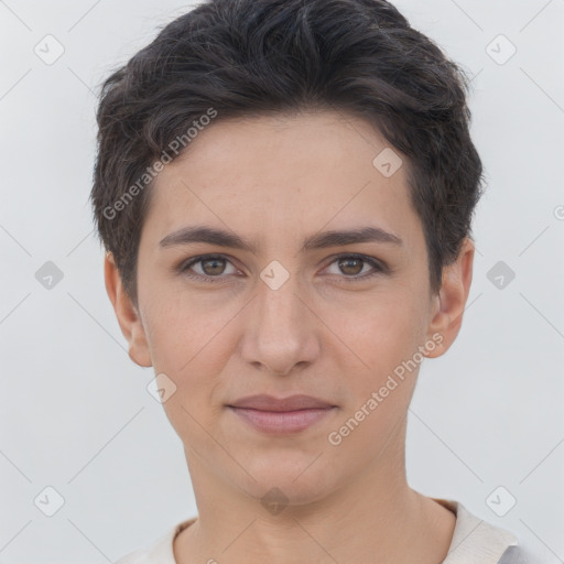 Joyful white young-adult female with short  brown hair and brown eyes