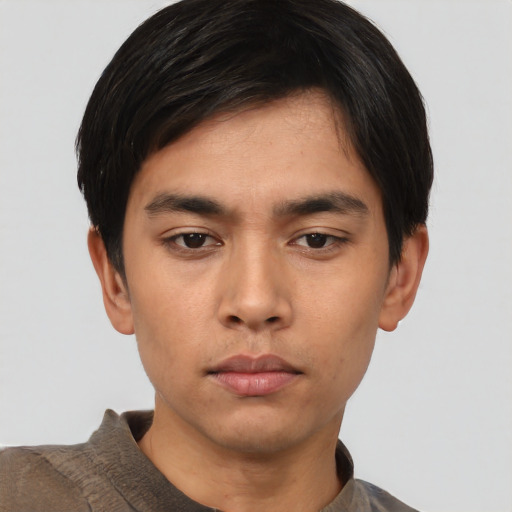Neutral asian young-adult male with short  black hair and brown eyes