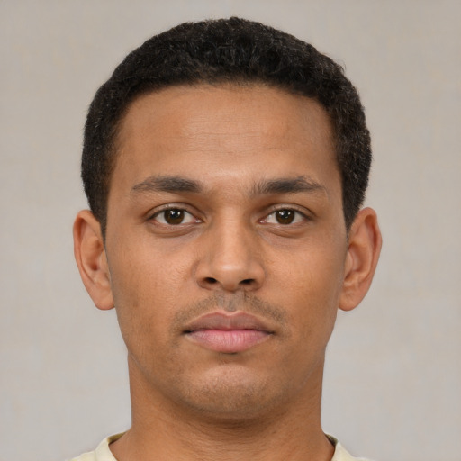 Neutral latino young-adult male with short  brown hair and brown eyes