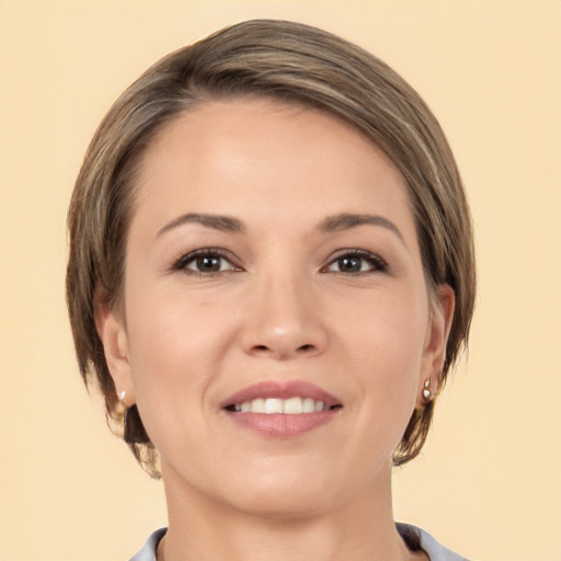 Joyful white young-adult female with medium  brown hair and brown eyes