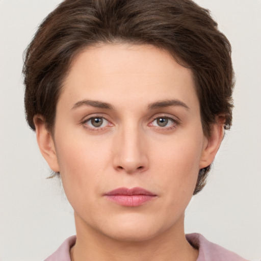 Neutral white young-adult female with short  brown hair and brown eyes