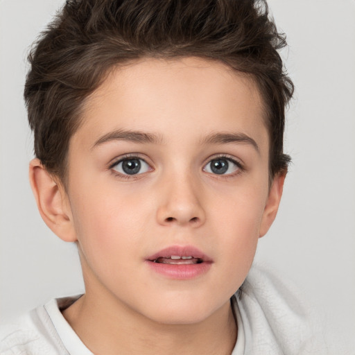 Joyful white child female with short  brown hair and brown eyes