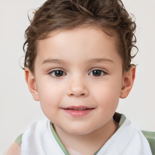 Joyful white child male with short  brown hair and brown eyes