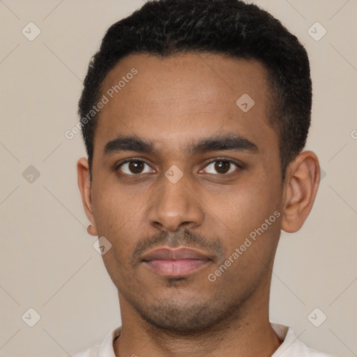 Neutral latino young-adult male with short  black hair and brown eyes