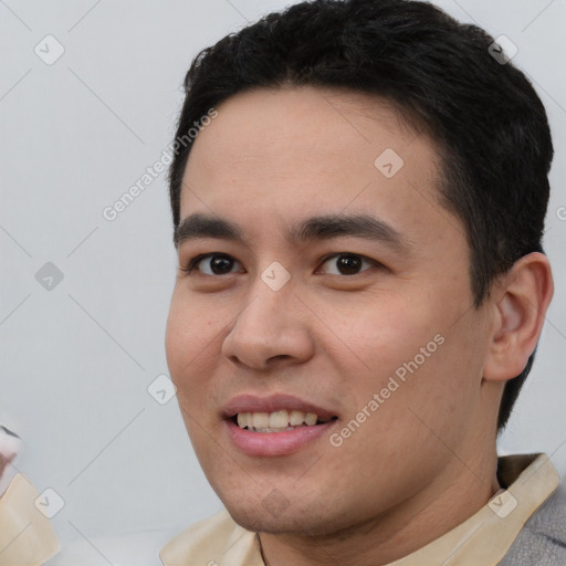 Joyful white young-adult male with short  black hair and brown eyes