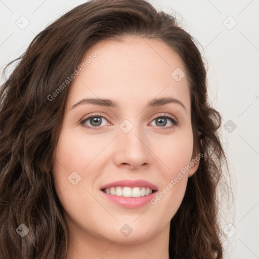 Joyful white young-adult female with long  brown hair and green eyes