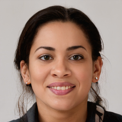 Joyful white young-adult female with medium  brown hair and brown eyes