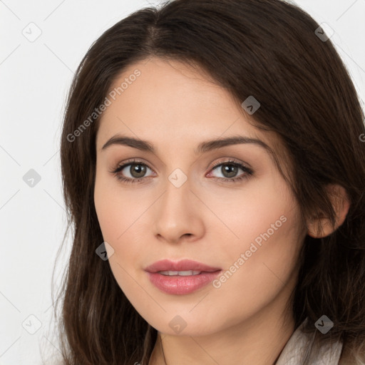 Neutral white young-adult female with long  brown hair and brown eyes