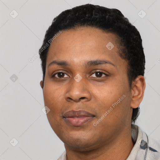Joyful black young-adult female with short  black hair and brown eyes