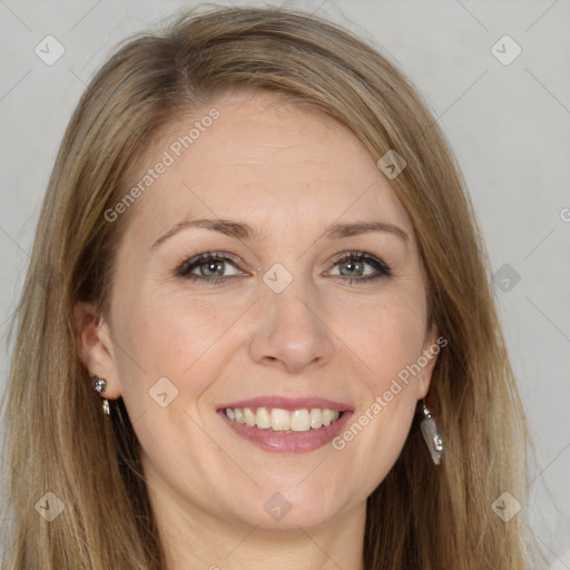 Joyful white adult female with long  brown hair and brown eyes