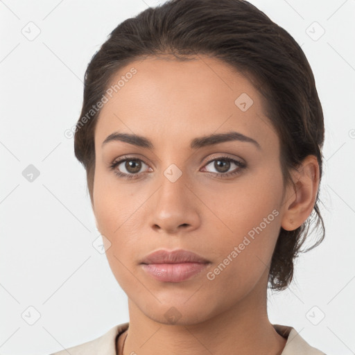 Neutral white young-adult female with medium  brown hair and brown eyes