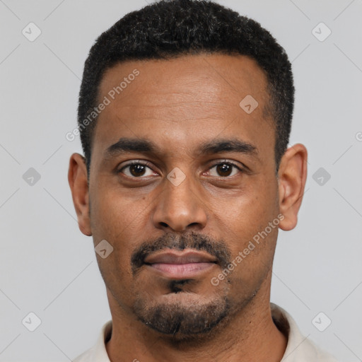 Neutral black young-adult male with short  black hair and brown eyes