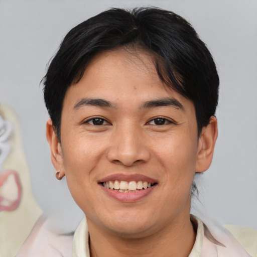 Joyful asian young-adult female with short  brown hair and brown eyes