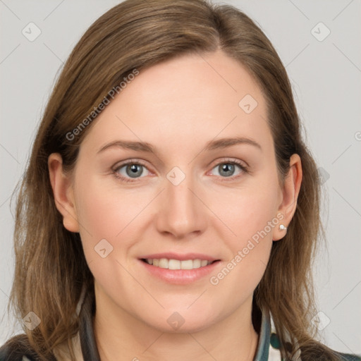 Joyful white young-adult female with long  brown hair and grey eyes