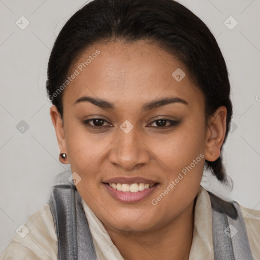 Joyful latino young-adult female with medium  brown hair and brown eyes