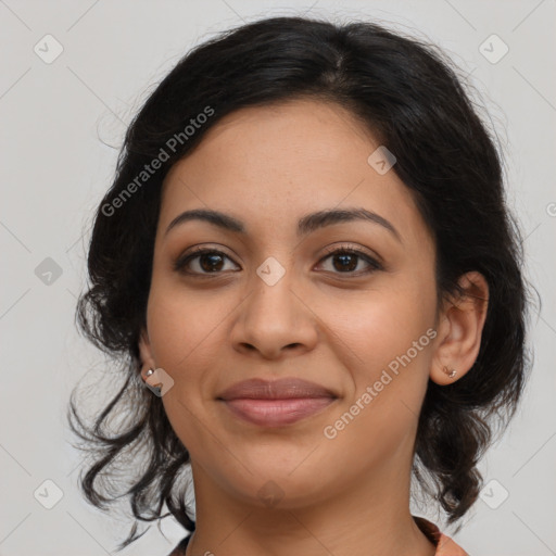 Joyful latino young-adult female with medium  brown hair and brown eyes