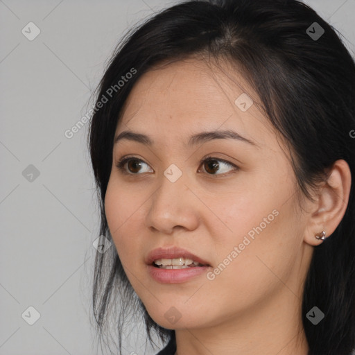 Joyful white young-adult female with medium  brown hair and brown eyes