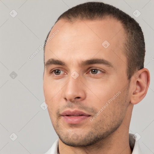 Neutral white young-adult male with short  brown hair and brown eyes