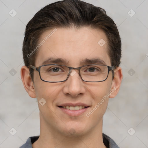 Joyful white adult male with short  brown hair and grey eyes