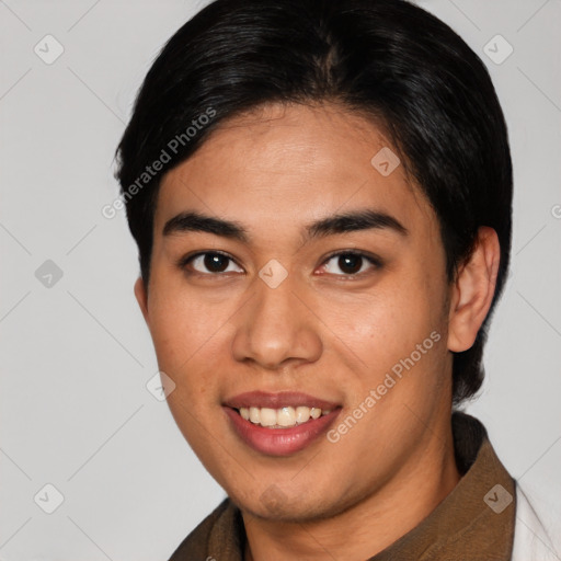 Joyful latino young-adult female with short  brown hair and brown eyes