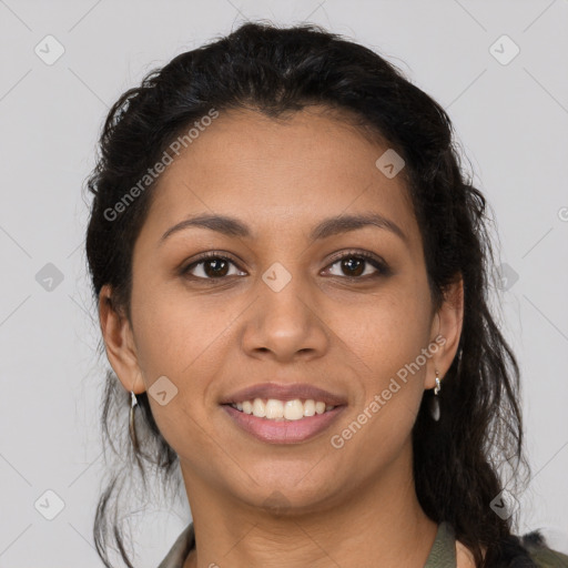 Joyful latino young-adult female with medium  brown hair and brown eyes