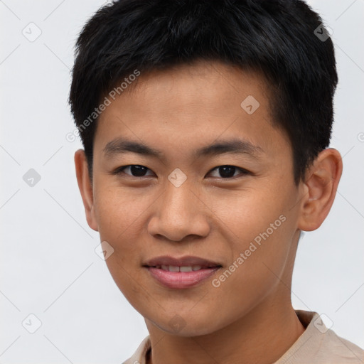 Joyful asian young-adult male with short  brown hair and brown eyes