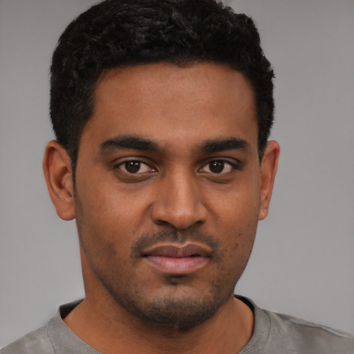 Neutral black young-adult male with short  black hair and brown eyes