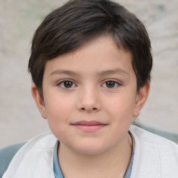 Joyful white child male with short  brown hair and brown eyes