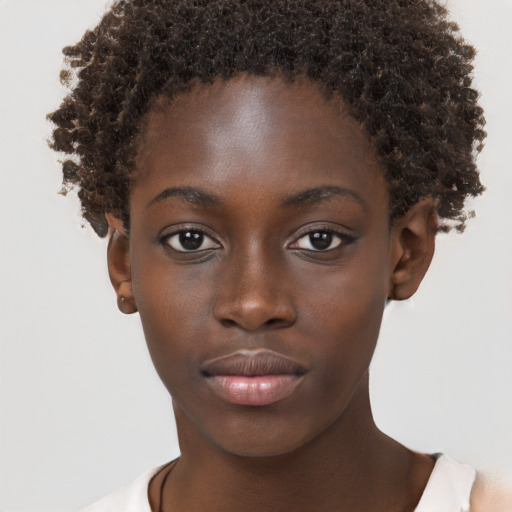 Neutral black young-adult female with short  brown hair and brown eyes