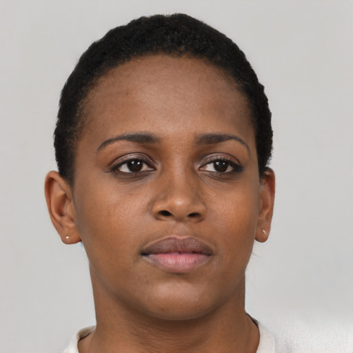 Neutral black young-adult female with short  brown hair and brown eyes