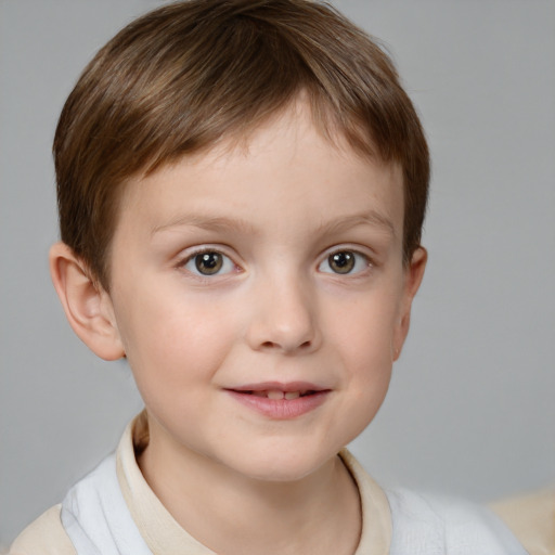 Joyful white child male with short  brown hair and brown eyes