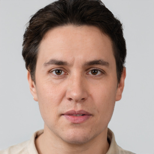 Neutral white adult male with short  brown hair and brown eyes