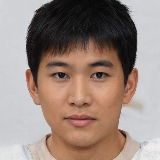 Neutral asian young-adult male with short  brown hair and brown eyes