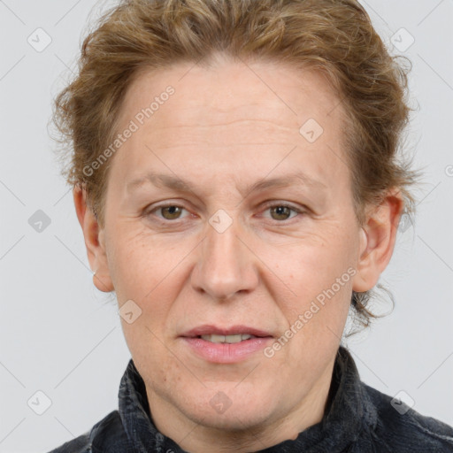 Joyful white adult female with short  brown hair and grey eyes