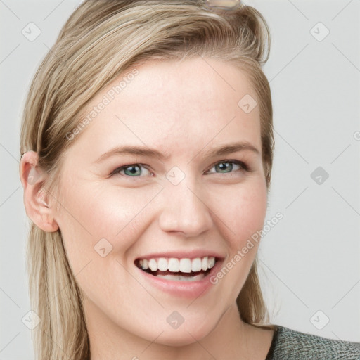 Joyful white young-adult female with medium  brown hair and blue eyes