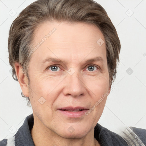 Joyful white adult male with short  brown hair and grey eyes