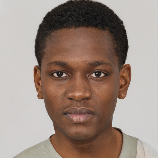 Neutral black young-adult male with short  brown hair and brown eyes