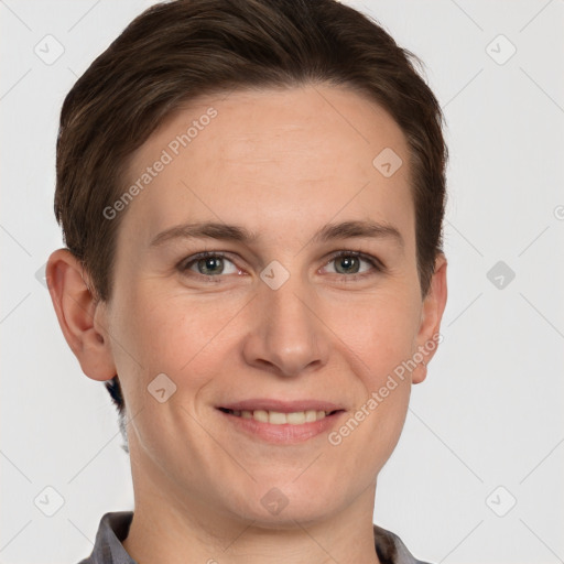 Joyful white young-adult female with short  brown hair and grey eyes