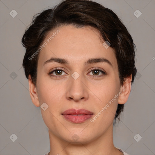 Joyful white adult female with medium  brown hair and brown eyes