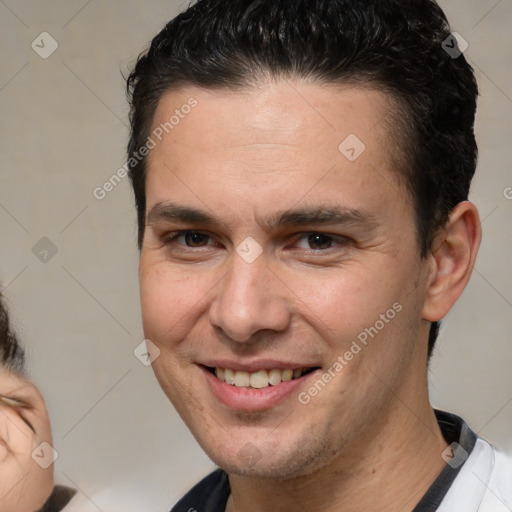 Joyful white young-adult male with short  brown hair and brown eyes