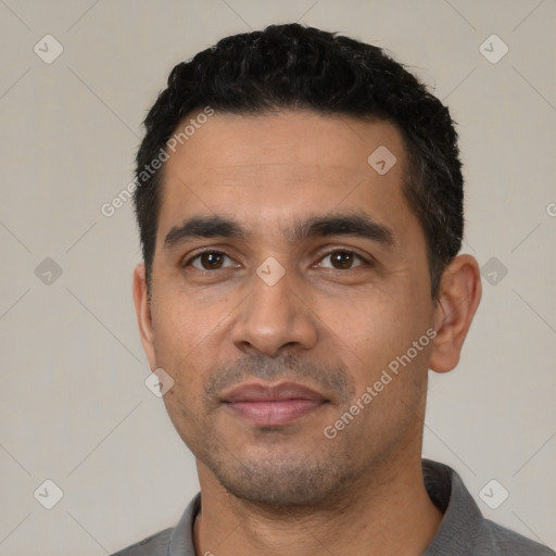 Neutral latino young-adult male with short  black hair and brown eyes