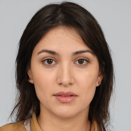Neutral white young-adult female with medium  brown hair and brown eyes