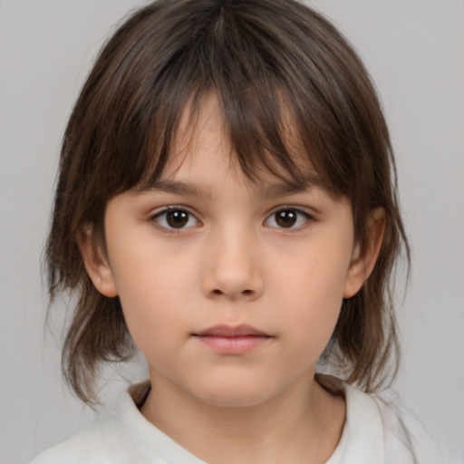 Neutral white child female with medium  brown hair and brown eyes