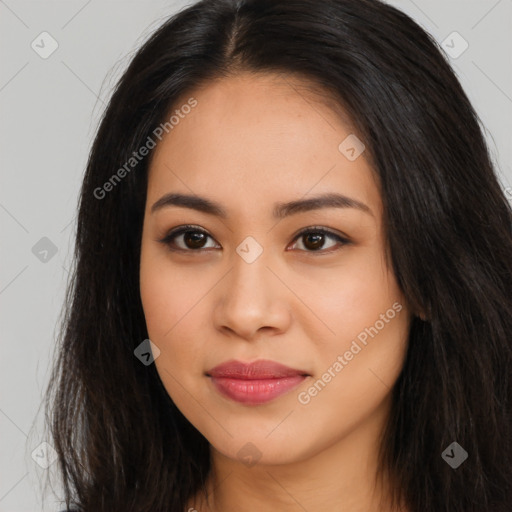 Joyful latino young-adult female with long  brown hair and brown eyes