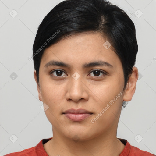 Joyful asian young-adult female with short  black hair and brown eyes