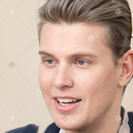 Joyful white young-adult male with short  brown hair and grey eyes