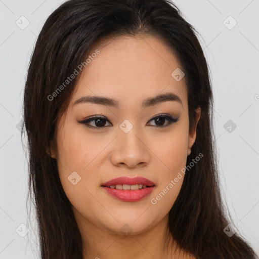 Joyful asian young-adult female with long  brown hair and brown eyes