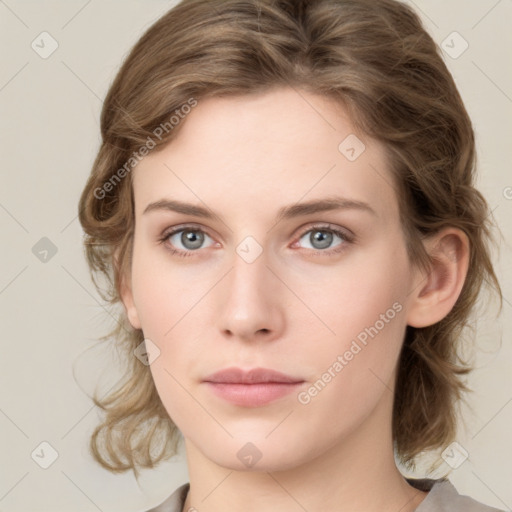 Neutral white young-adult female with medium  brown hair and grey eyes